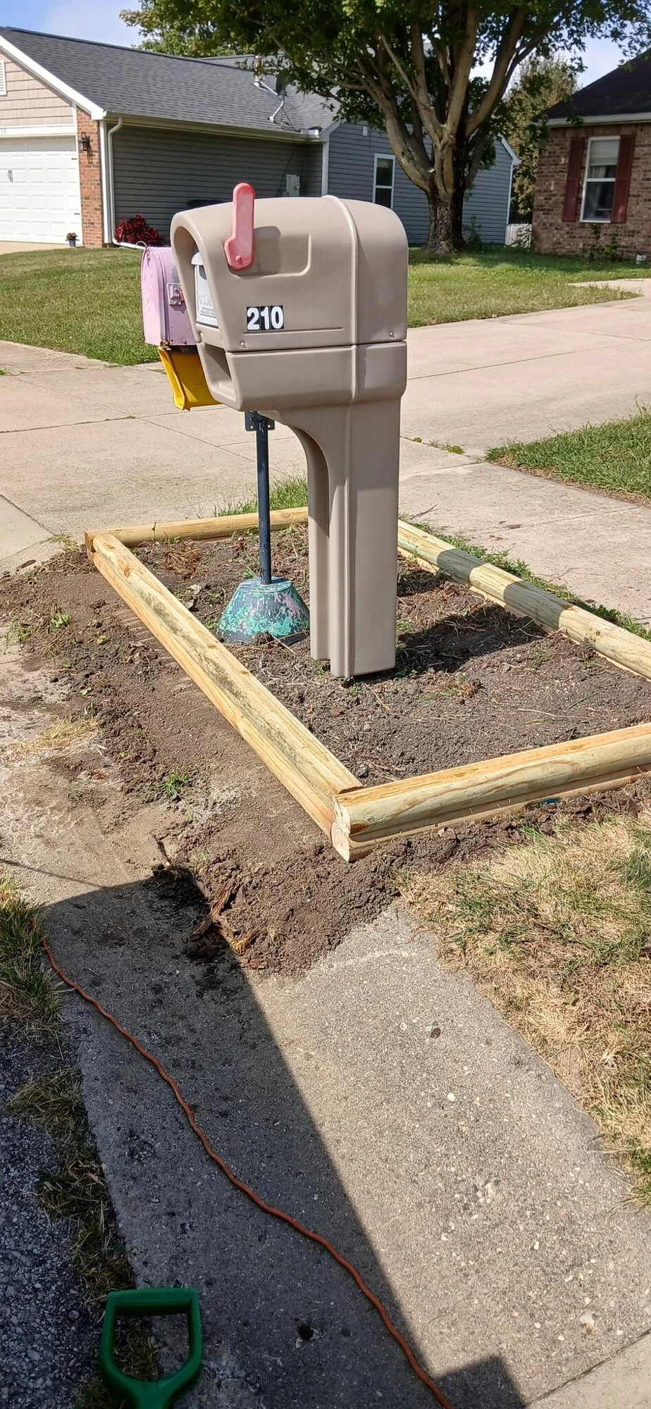 Mailbox and timber border project photo from Tommy’s Nextdoor gallery